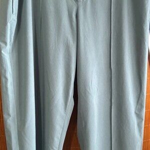 Athleta Pants W 12 nylon wide leg sage green side and rear zip pocket athleisure
